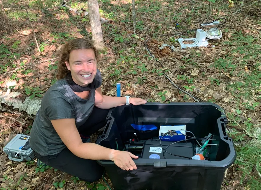 Jamie with Aeris instrument and soil chamber in the background.