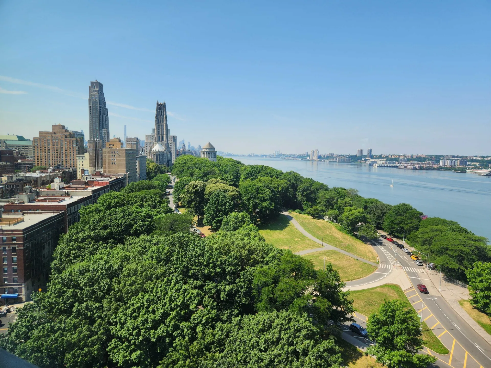 View of Riverside Park looking south from 125th. Trees are surrounded by roads