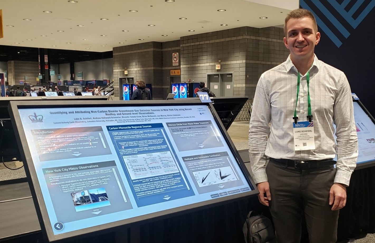 Luke Schiferl presenting a virtual poster in the poster hall at AGU