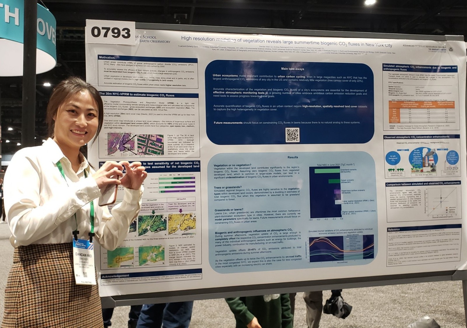 Dandan Wei presenting her poster in the AGU poster hall.