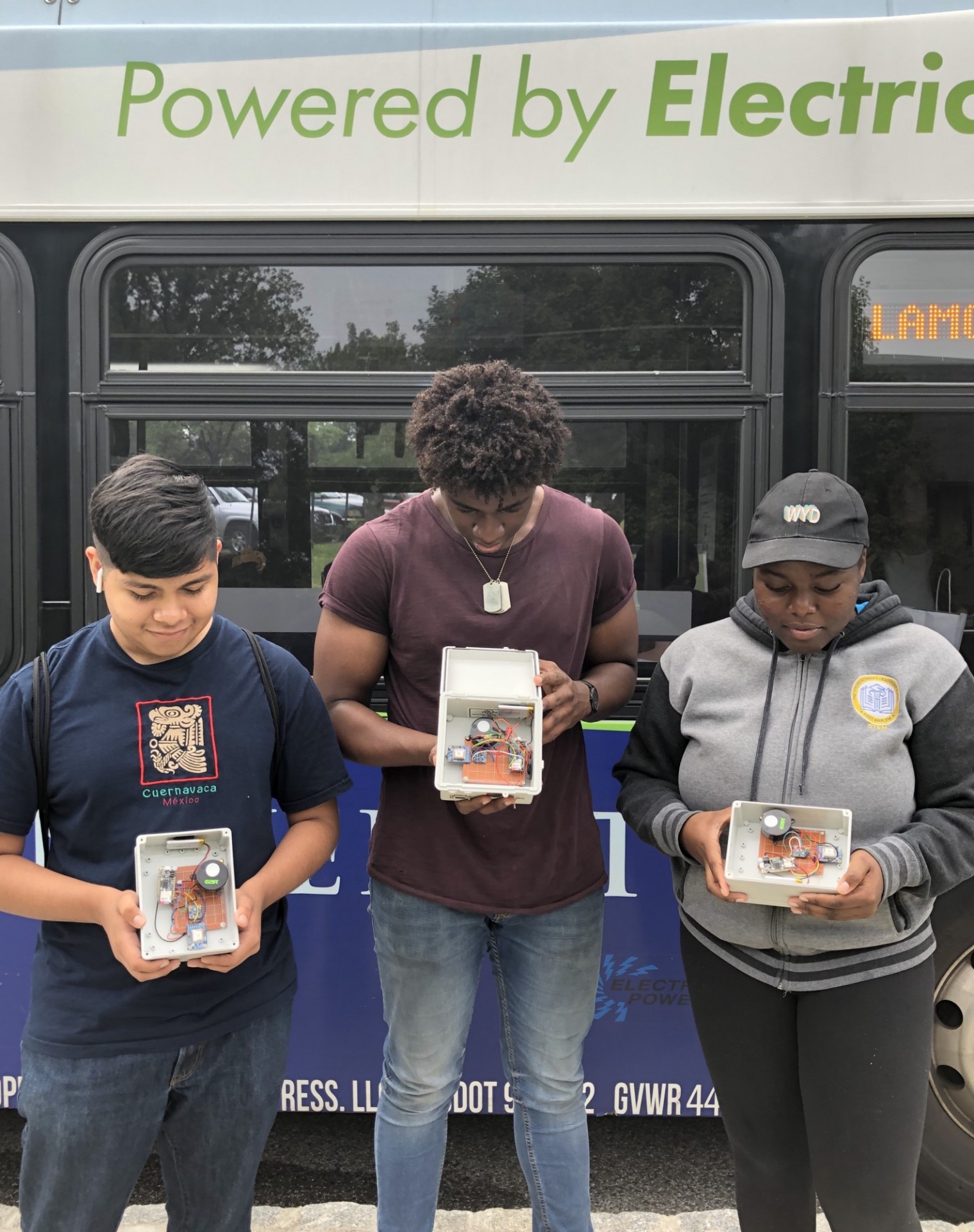 High School Engineering Team with CO2 sensors and the Columbia Electric shuttle