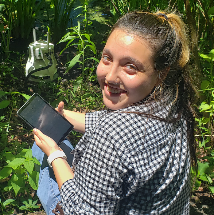 Christine measuring methane fluxes in a swamp! 